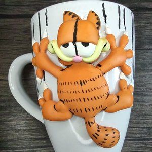 Mug decorated in porcelain cold. Handmade 100%.